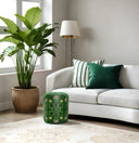 Green Forest ottoman. Styled with an Emerald green and white stripes cushion on white sofa.