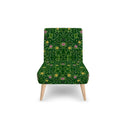 Green Forest occasional chair. The playful yet sophisticated design features a bold green forest colour with contrasting pink and yellow floral pattern. Front view.