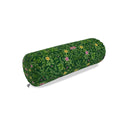 A cylindrical  bolster pillow with a green botanical and floral pattern, featuring small yellow and pink flowers, shown on a plain white background.
