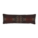 A long rectangular lumbar pillow in dark brown with a beige ornate pattern and matching side motifs, shown against a plain white background.