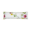 A long rectangular lumbar pillow with a white linen-textured background, decorated with a watercolor-style floral pattern of pink, yellow, and white flowers with green leaves, finished with a thin yellow piping border.