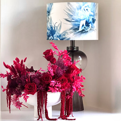 Evon Blue Lampshade styled with a stunning preserved Red roses floral arrangement. 