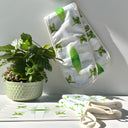 Gumleaf Green Double Oven Glove, styled with Oven mittens and Stonemax cutting board. 