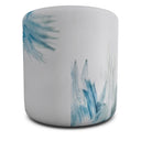 Evon Blue ottoman on white background. Side view. 