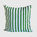 A square throw pillow with in velvet with a pattern of vertical green and white stripes, shown against a plain light gray background.