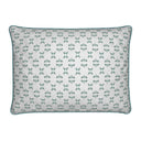 Green and white cotton linen cushion with green piping and an elegant pattern on the cushion front.