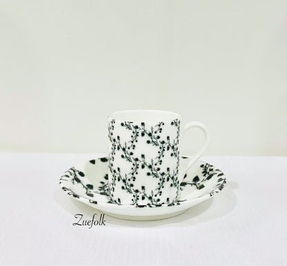 Grounded, peaceful, textured lux is what you will find in this Coffee Cup and Espresso cup and saucer Bone China ensemble. 