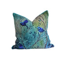 Decorative pillow with blue birds on branches design on a teal background. Cushion  front .