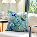 Teal and Blue Decorative pillow with splendid wren design on cream armchair. 