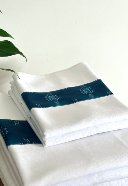 Strip towels, teal and white. Adorned with a satin strip. Soft and elegant. Set of 4 