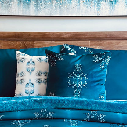 Teal Bedding Styled with Evon Blue cushions  and velvet throw