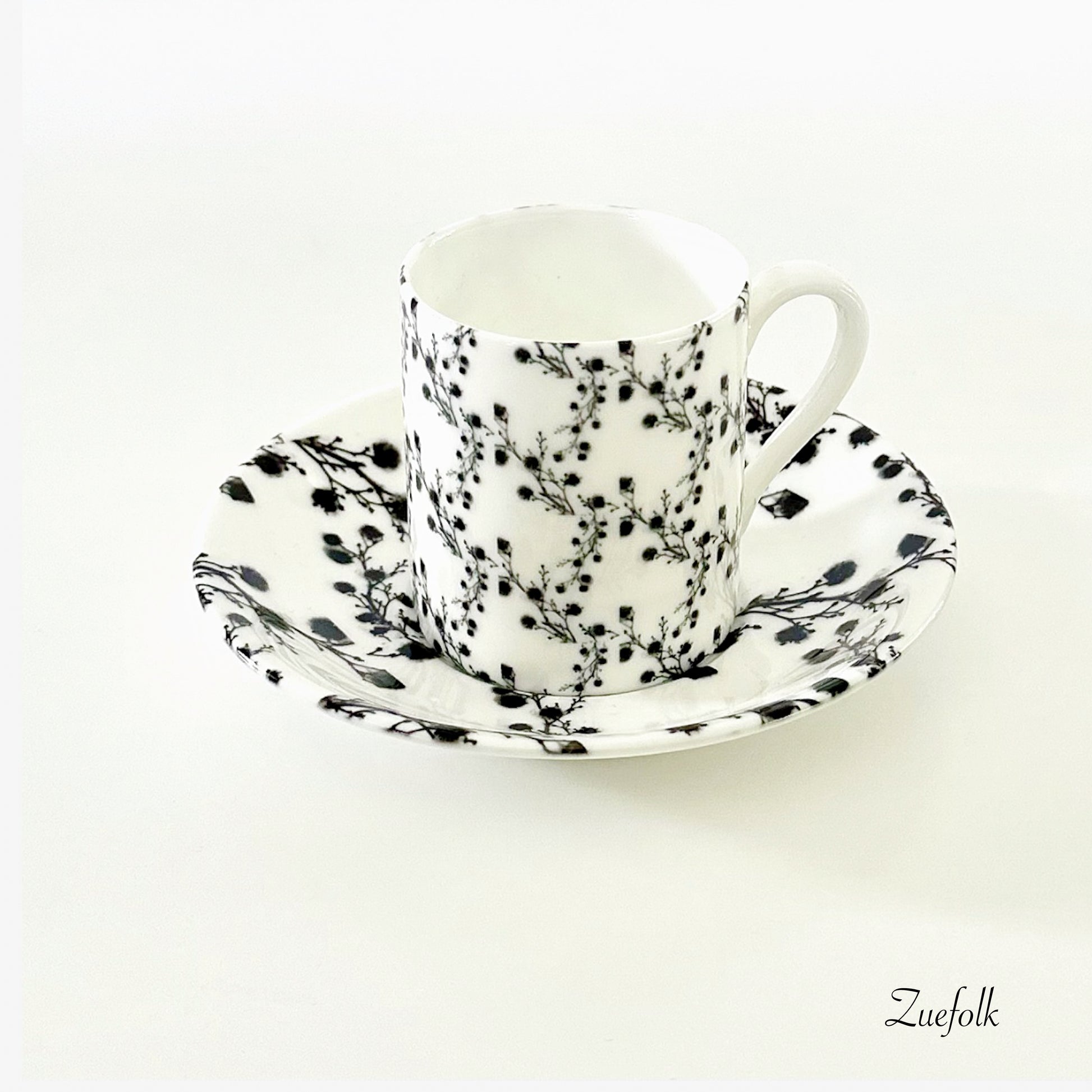 Grounded, peaceful, textured lux is what you will find in this Coffee Cup and Espresso cup and saucer Bone China ensemble.  Espresso Cup 