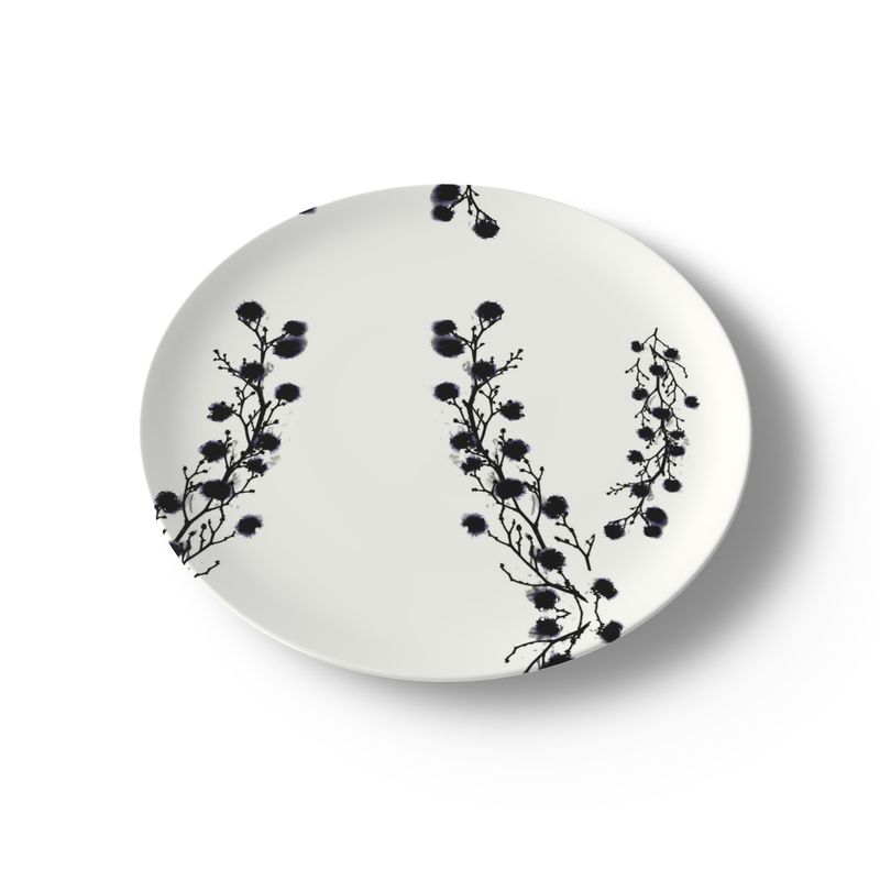 Zuko Dinner Plate. Zuko dinner set plate is grounded, textured, hand-made Bone China plate is chic and subtle. Add your own pop of colour for a mix and match table-scape. Front view