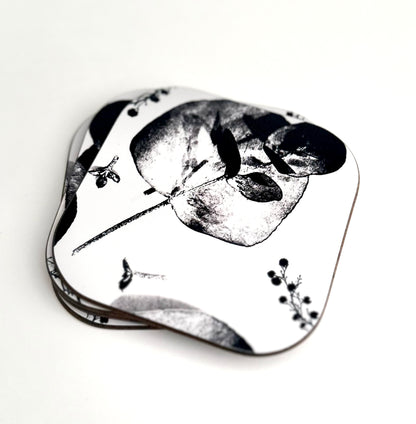 Coasters . Zuko Gumleaf. Black and white Coasters  are Hand made 
Heat resistant, durable
Super sharp beautiful high quality permanent print
Glossy surface with hard wooden base which will protect the surface of your furniture 
Easy to care for and maintain