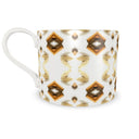 This Cinnamon inspired Maggie coffee cup and espresso cup and saucer ensemble. ( Larger Tea/ coffee cup)