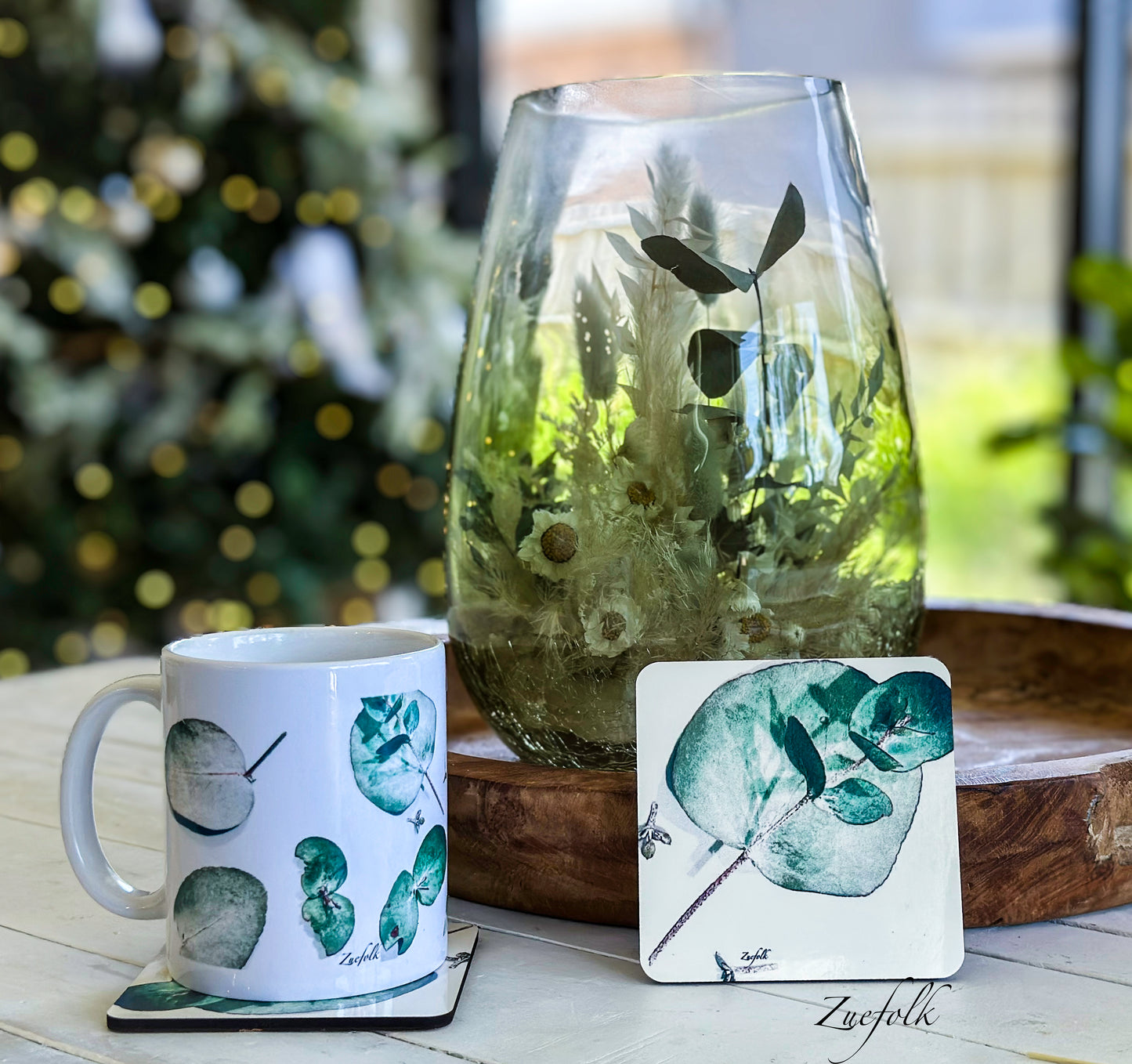 Eucalyptus Green and white Coasters  are Hand made 
Heat resistant, durable
Super sharp beautiful high quality permanent print
Glossy surface with hard wooden base which will protect the surface of your furniture 
Easy to care for and maintain